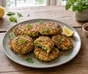 Golden zucchini and halloumi fritters with sesame, mint and a light chilli honey drizzle